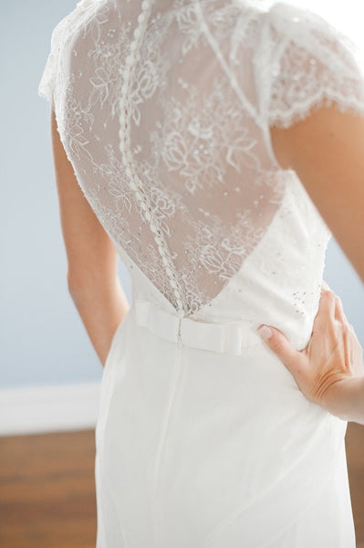A line V neck Cap Sleeves White Long Lace Wedding Dress Details